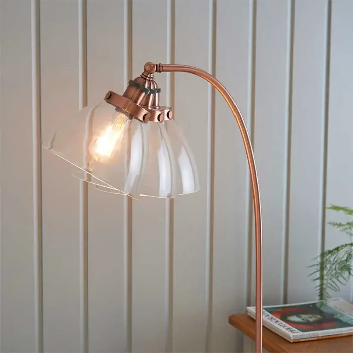 Floor lamp in aged copper finish with adjustable knuckle joint