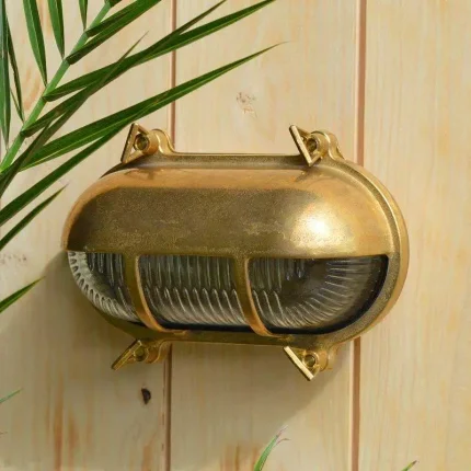 Brass Eyelid Coastal Wall Light