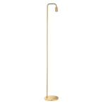 Floor lamp in a brushed brass finish showcases a clean line design