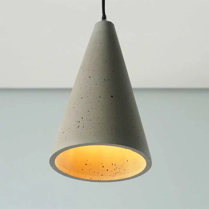 Conical shape pendant light in a sleek grey colour made from concrete