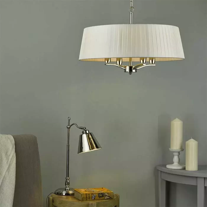 Pendant light with ivory shade in polished nickel finish