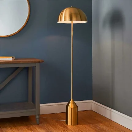 Modern floor lamp in an antique brass finish