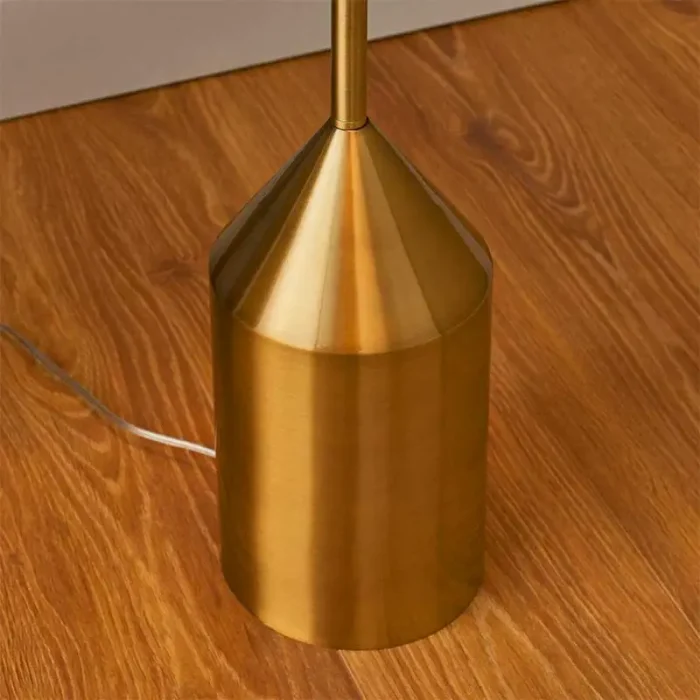 Modern floor lamp in an antique brass finish