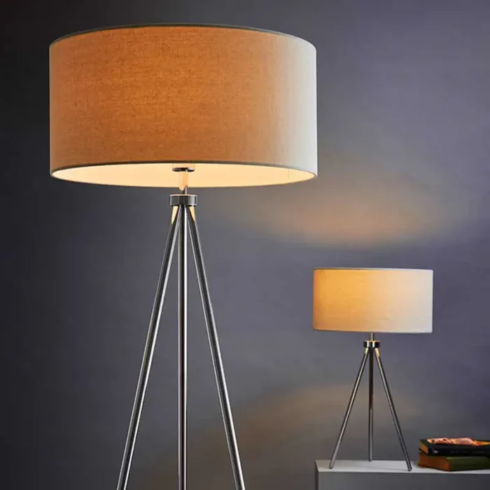 Tripod modern floor lamp in polished chrome finish with ivory linen fabric shade