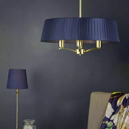 Pendant light with navy shade in satin brass finish