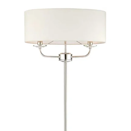 Floor lamp in bright nickel finish with vintage white faux silk shade