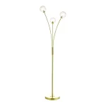 Floor lamp in satin brass finish feature three curved arms, each adorned with frosted glass shade