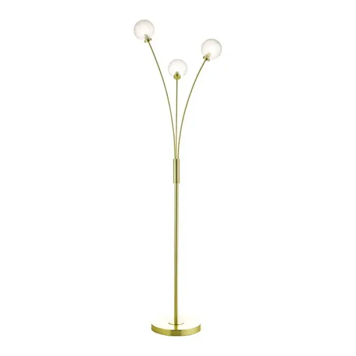 Floor lamp in satin brass finish feature three curved arms, each adorned with frosted glass shade