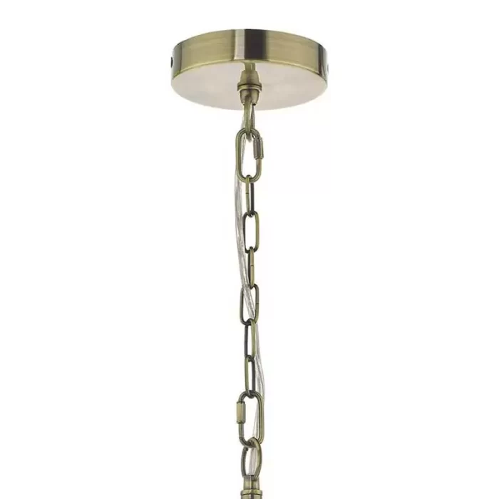 Pendant light with taupe shade in antique brass finish