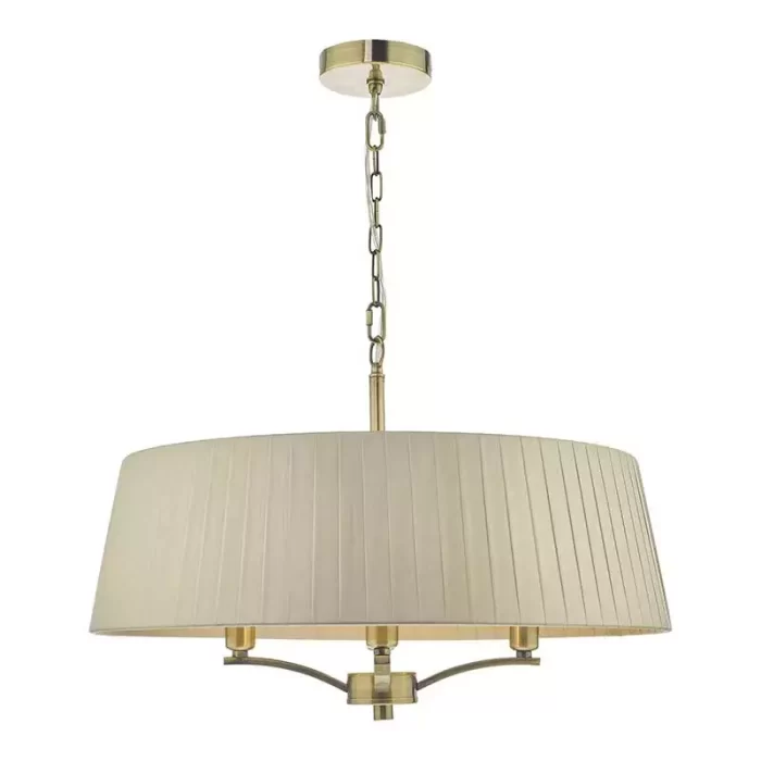 Pendant light with taupe shade in antique brass finish