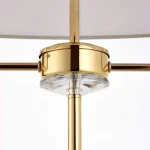 Floor lamp in polished brass finish with vintage white silk shade