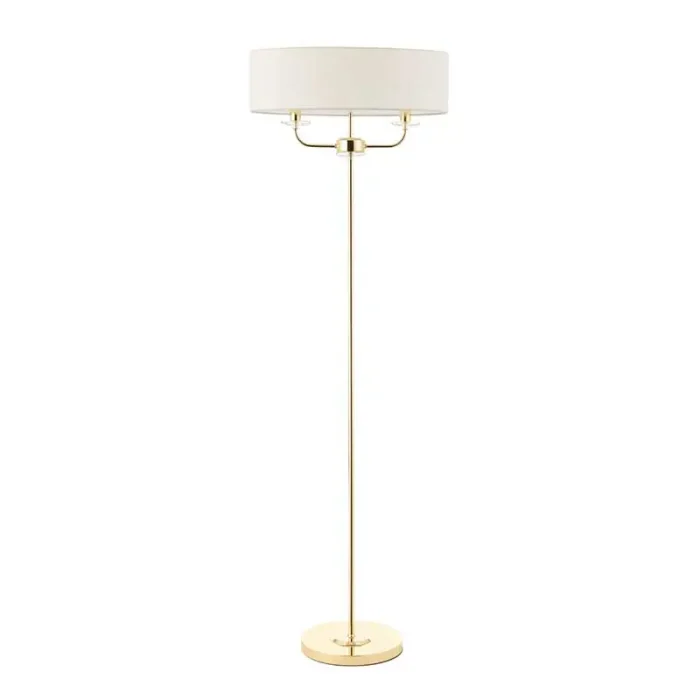 Floor lamp in polished brass finish with vintage white silk shade