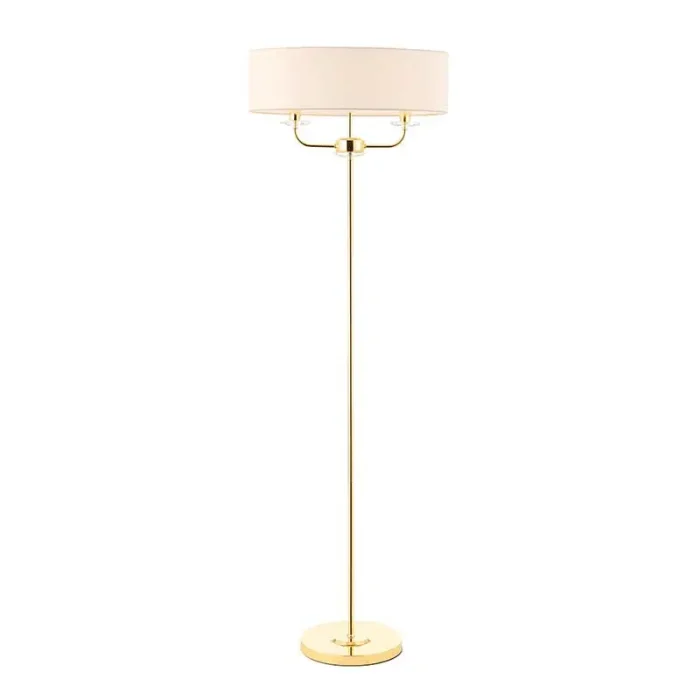 Floor lamp in polished brass finish with vintage white silk shade