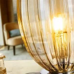 Table lamp with cognac glass shade