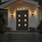 Black clear glass outdoor wall light at entrance