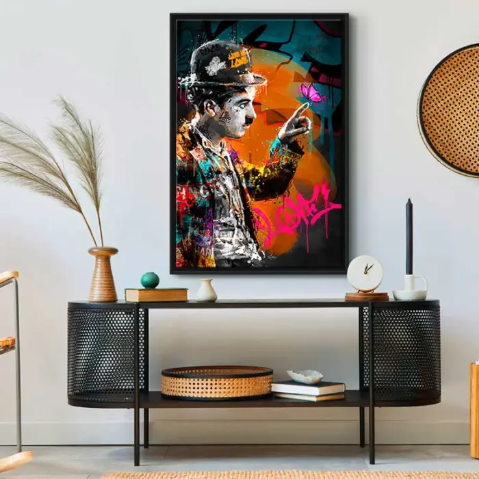 Wall art of Charlie Chaplin with butterfly