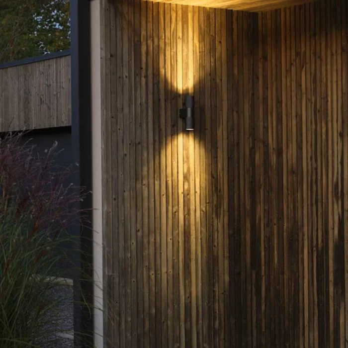 Black up & down outdoor wall light for patio, entrance and garden areas