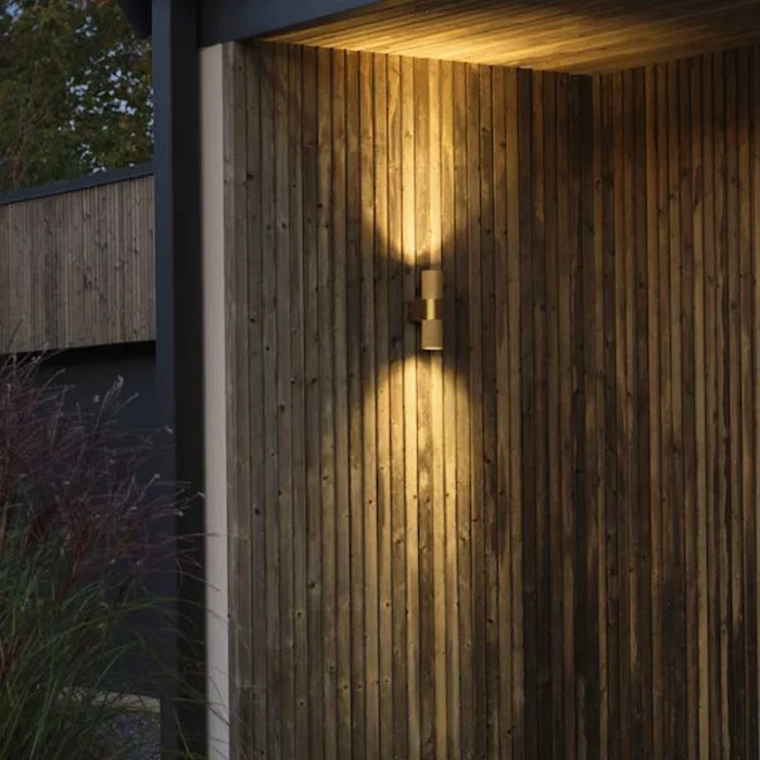 Gold up & down outdoor wall light for patio, entrance and garden areas