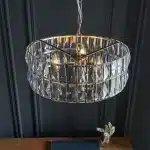 3 light pendant light in bright nickel finish with clear glass