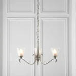 3 light pendant light in polished nickel finish with art deco glass shades