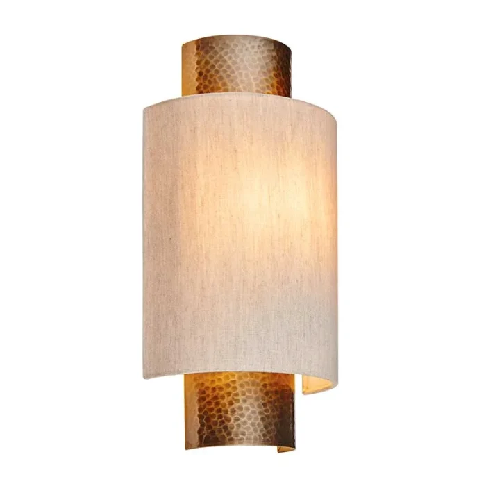 Wall light in aged bronze finish with natural fabric shade