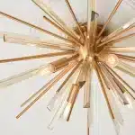 Antique brass plated flush ceiling light in starburst design for sitting room. living room and hallway