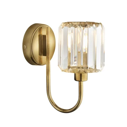 Wall light in antique brass plated finish