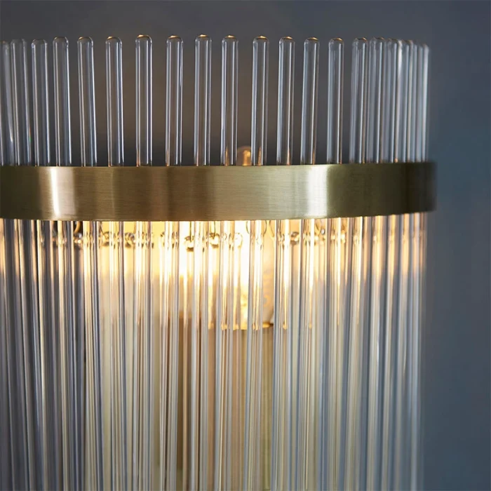 Wall light in antique brass plated finish with clear glass rods