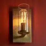 Brass hammered wall light clear glass shade