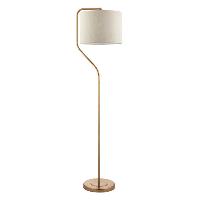 Floor lamp in brushed aged brass finish with natural linen fabric shade