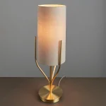 Table lamp in satin brass finish with natural linen fabric shade