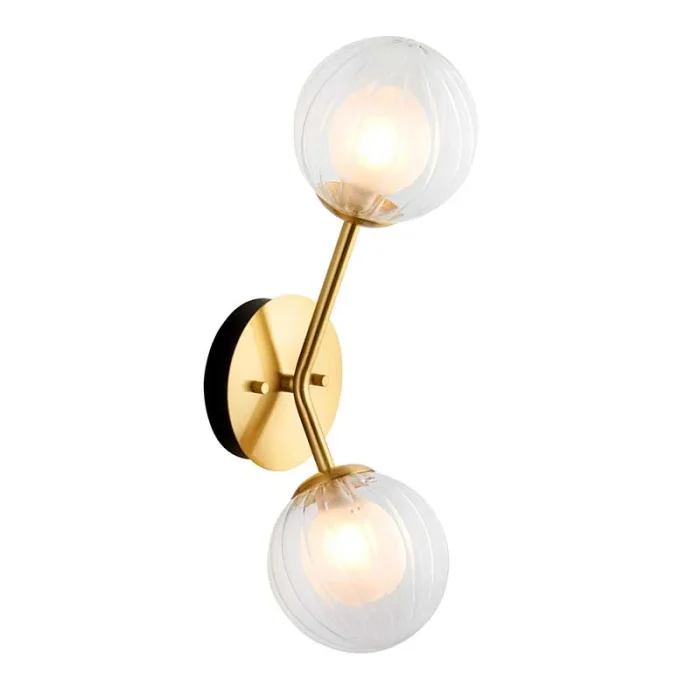 Wall light in satin brass finish with clear ribbed glass