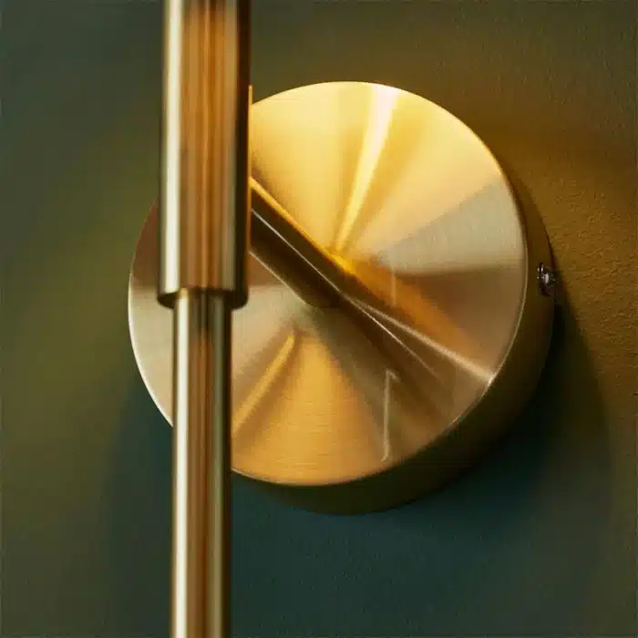 Satin brass wall light backplate detailing