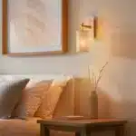 Brass marble effect wall light with linen shade mounted downwards